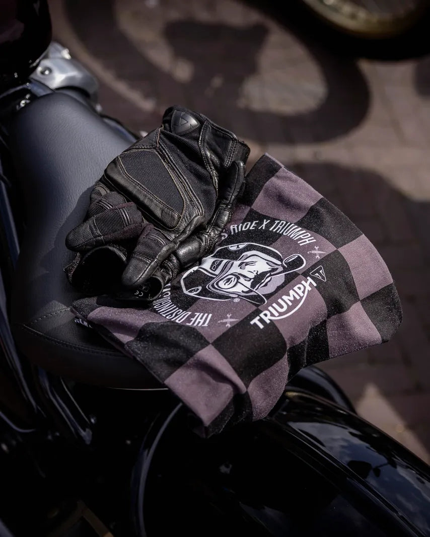 Black Montgomery leather riding glove with stitched detailing and a snap closure at the wrist.